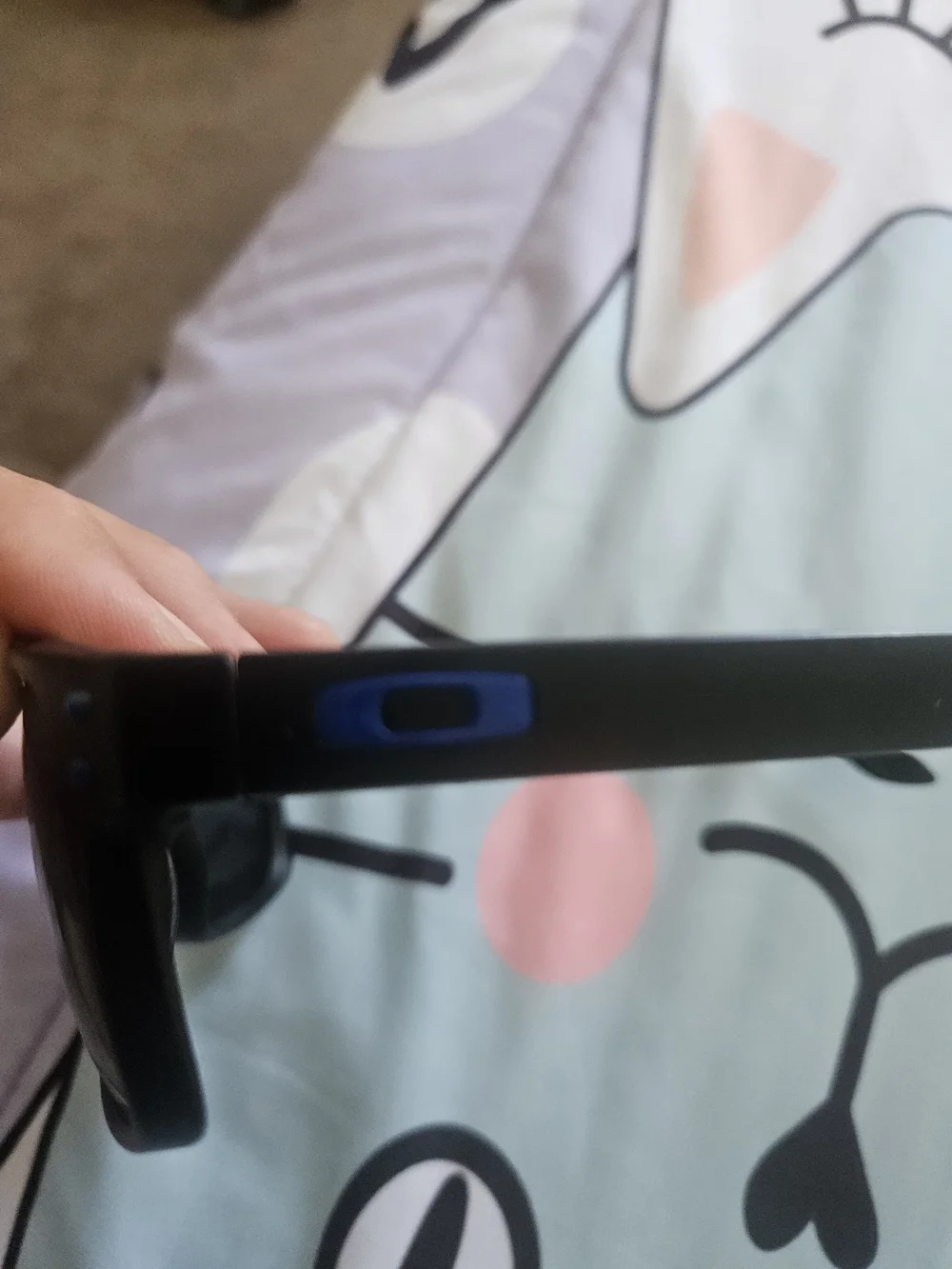 Oakley Black Frame Sunglasses with Blue Mirrored Lenses